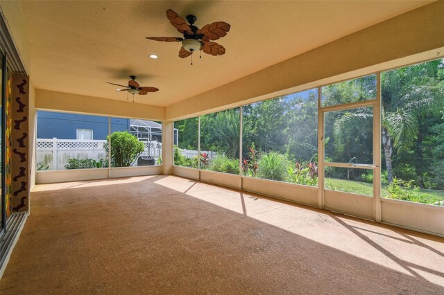 4089 Windcrest Dr, Wesley Chapel, FL 33544 - unfurnished sunroom with ceiling fan and plenty of natural light