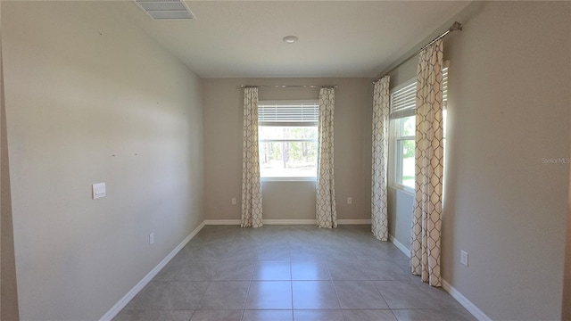 13111 Pepper Stem St, Spring Hill, FL 34609 - unfurnished room featuring light tile patterned flooring and baseboards
