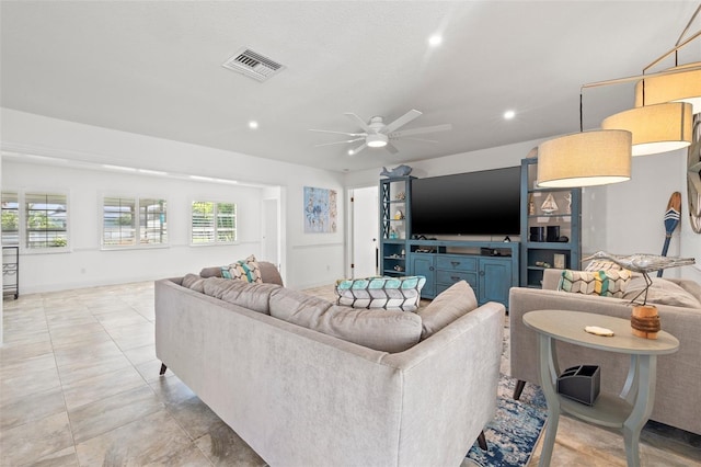 629 Fort Duquesna Dr, Sun City Center, FL 33573 - living room featuring ceiling fan, recessed lighting, baseboards, and light tile patterned flooring