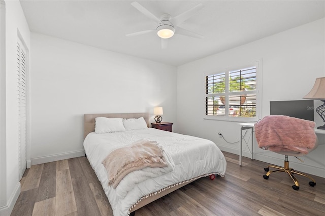 629 Fort Duquesna Dr, Sun City Center, FL 33573 - bedroom with wood finished floors, baseboards, a ceiling fan, and an office area