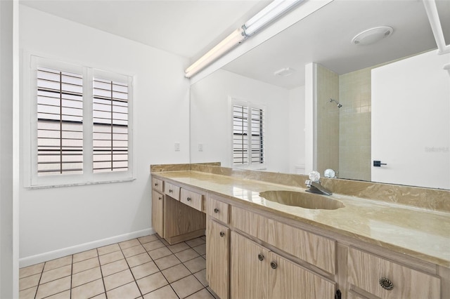 629 Fort Duquesna Dr, Sun City Center, FL 33573 - bathroom with vanity, tile patterned floors, baseboards, a shower, and toilet