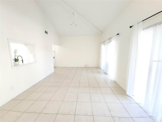 2935 Lichen Ln Unit D, Clearwater, FL 33760 - spare room featuring high vaulted ceiling and light tile patterned flooring