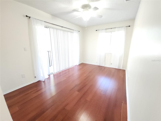 2935 Lichen Ln Unit D, Clearwater, FL 33760 - spare room with ceiling fan and wood finished floors