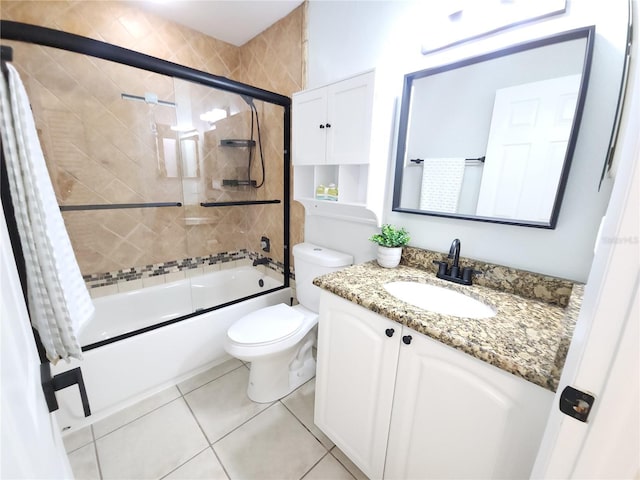 2935 Lichen Ln Unit D, Clearwater, FL 33760 - full bath with enclosed tub / shower combo, vanity, and tile patterned floors