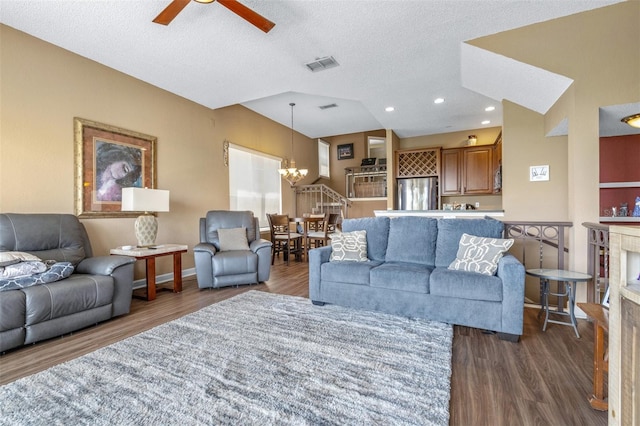731 Cruise View Dr, Tampa, FL 33602 - living area with a ceiling fan, a chandelier, dark wood-type flooring, a textured ceiling, and baseboards