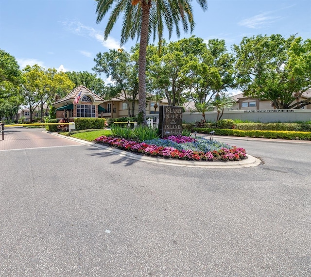 731 Cruise View Dr, Tampa, FL 33602 - view of asphalt road with curbs and a gated entry