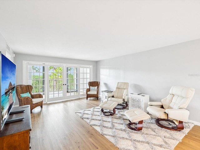 3062 Eastland Blvd Unit 405, Clearwater, FL 33761 - sitting room featuring wood finished floors and french doors
