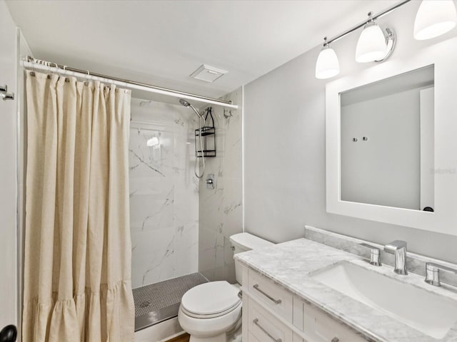 3062 Eastland Blvd Unit 405, Clearwater, FL 33761 - full bathroom featuring toilet, vanity, and a marble finish shower