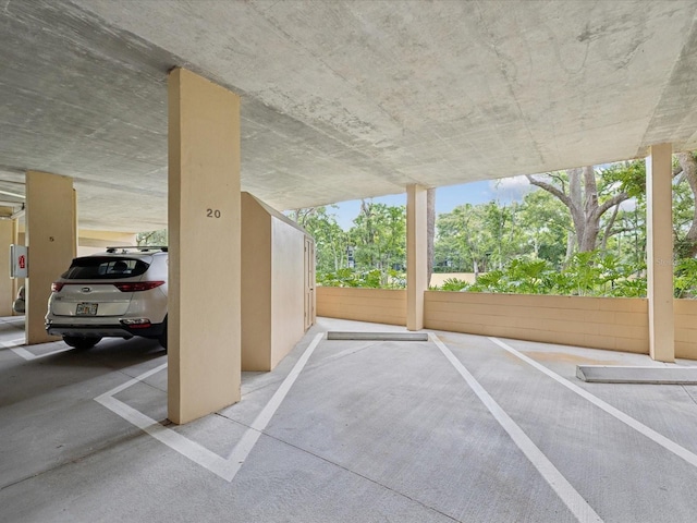 3062 Eastland Blvd Unit 405, Clearwater, FL 33761 - view of vehicle parking with a parking deck