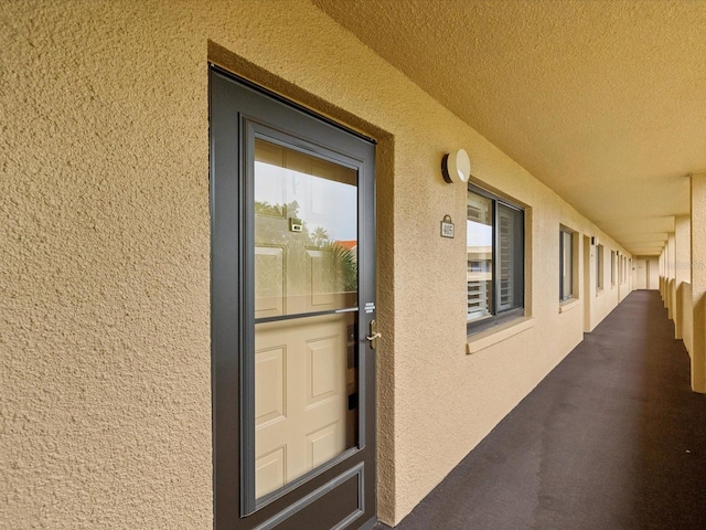 3062 Eastland Blvd Unit 405, Clearwater, FL 33761 - view of exterior entry with stucco siding