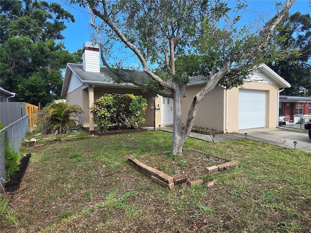 7920 52nd St N, Pinellas Park, FL 33781 - view of front of house featuring concrete driveway, a chimney, a garage, and stucco siding