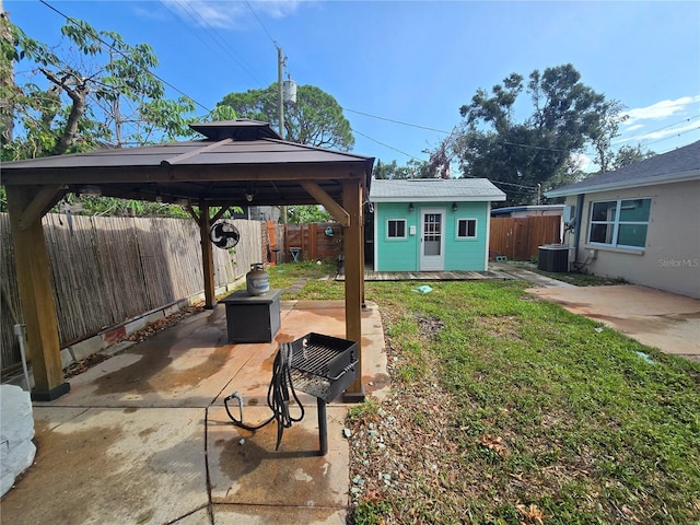 7920 52nd St N, Pinellas Park, FL 33781 - view of yard with a gazebo, a patio, central AC, and an outdoor structure