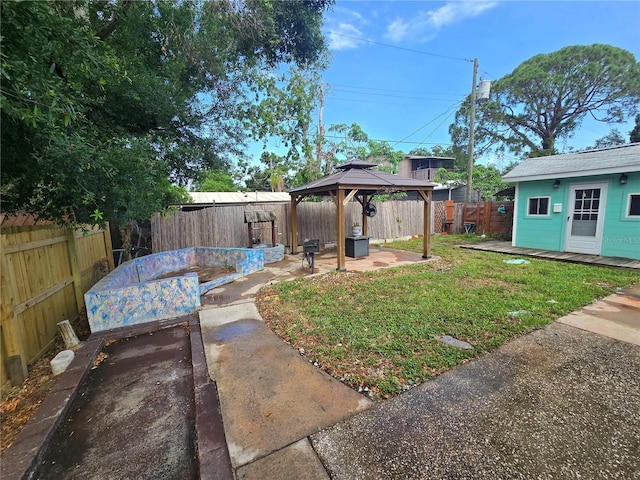 7920 52nd St N, Pinellas Park, FL 33781 - view of yard with a gazebo, a patio area, and an outdoor structure