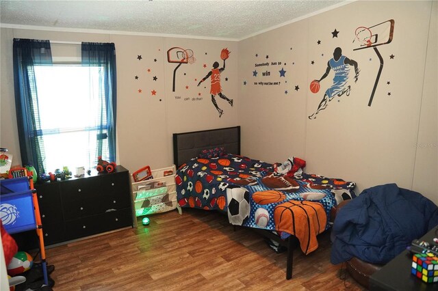 12008 Rose Ln, Riverview, FL 33569 - bedroom with wood finished floors, a textured ceiling, and crown molding