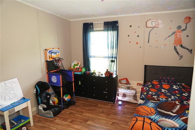 12008 Rose Ln, Riverview, FL 33569 - bedroom featuring wood finished floors, a textured ceiling, and crown molding