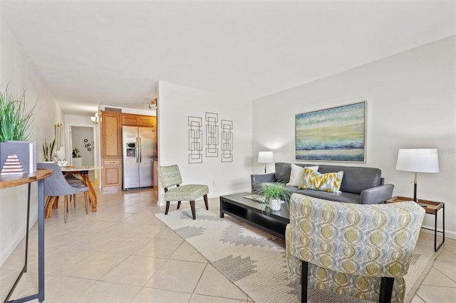 232 36th Ave N Unit 202C, Saint Petersburg, FL 33704 - living room with light tile patterned floors and baseboards
