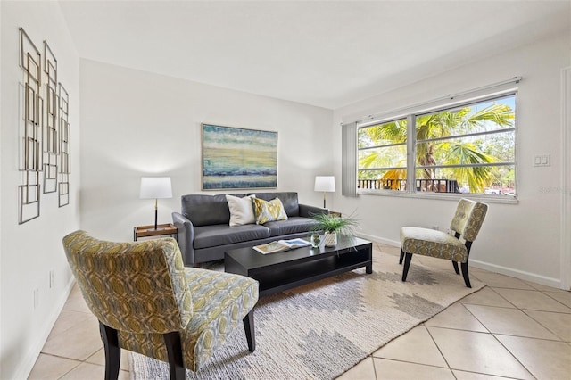 232 36th Ave N Unit 202C, Saint Petersburg, FL 33704 - living room with light tile patterned floors and baseboards