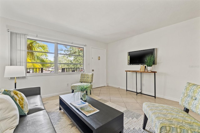 232 36th Ave N Unit 202C, Saint Petersburg, FL 33704 - living area with tile patterned floors and baseboards