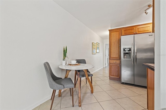 232 36th Ave N Unit 202C, Saint Petersburg, FL 33704 - dining space featuring light tile patterned floors and baseboards