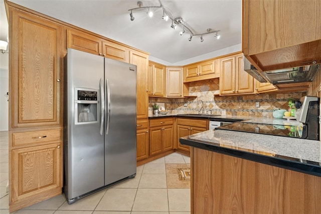 232 36th Ave N Unit 202C, Saint Petersburg, FL 33704 - kitchen with stainless steel refrigerator with ice dispenser, a sink, light tile patterned flooring, tasteful backsplash, and range hood