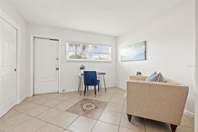 232 36th Ave N Unit 202C, Saint Petersburg, FL 33704 - sitting room with light tile patterned floors and baseboards