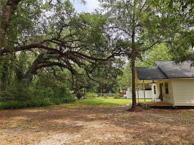 18452 Fort Dade Ave, Brooksville, FL 34601 - view of yard featuring a deck and ceiling fan