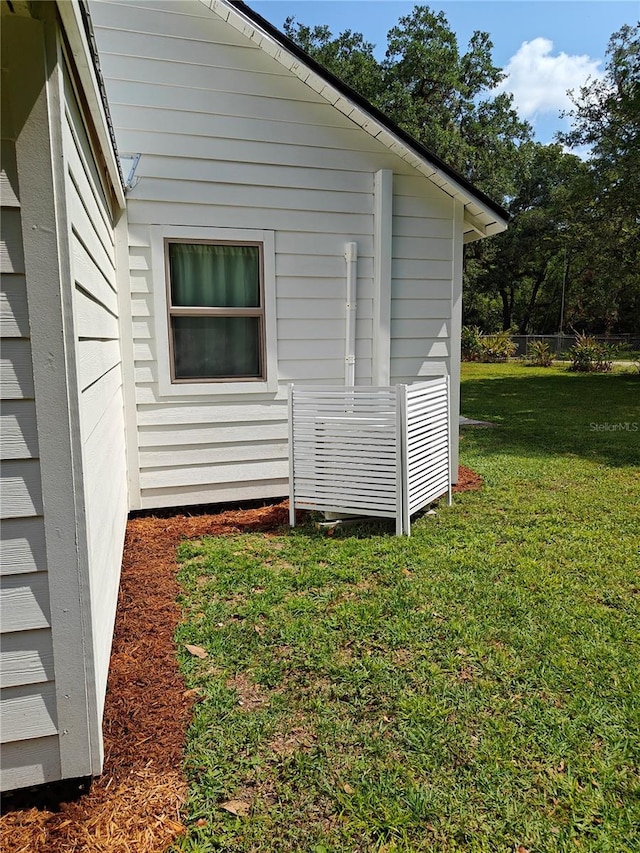 18452 Fort Dade Ave, Brooksville, FL 34601 - view of property exterior with a yard