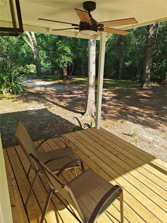 18452 Fort Dade Ave, Brooksville, FL 34601 - wooden terrace featuring a ceiling fan