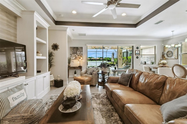 222 Toscavilla Blvd, Nokomis, FL 34275 - living room featuring a ceiling fan, crown molding, a raised ceiling, a chandelier, and recessed lighting