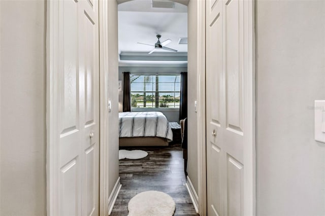 222 Toscavilla Blvd, Nokomis, FL 34275 - corridor with dark wood finished floors and ornamental molding