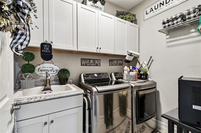 222 Toscavilla Blvd, Nokomis, FL 34275 - laundry room with independent washer and dryer and cabinet space