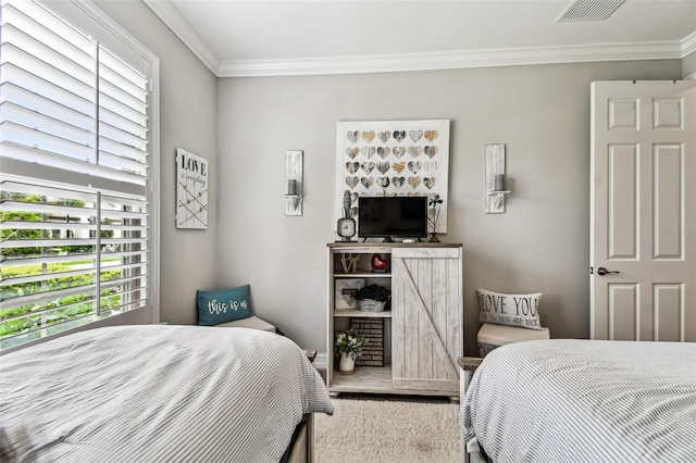 222 Toscavilla Blvd, Nokomis, FL 34275 - bedroom featuring multiple windows, ornamental molding, and carpet floors