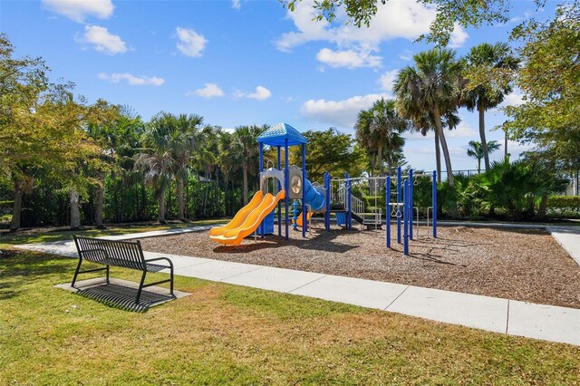 222 Toscavilla Blvd, Nokomis, FL 34275 - communal playground featuring a yard