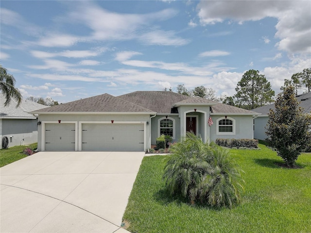 3813 Salida Delsol Dr, Sun City Center, FL 33573 - single story home with stucco siding, an attached garage, concrete driveway, and a front yard