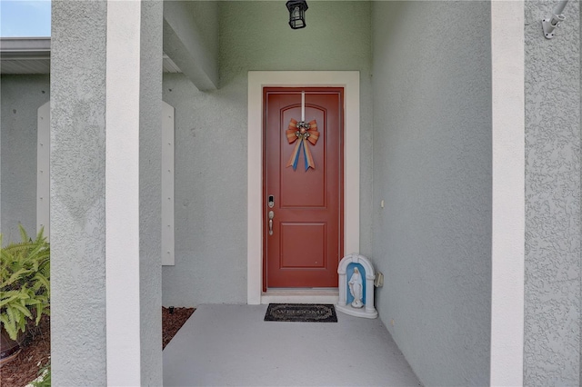 3813 Salida Delsol Dr, Sun City Center, FL 33573 - property entrance featuring stucco siding