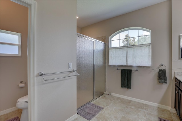 3813 Salida Delsol Dr, Sun City Center, FL 33573 - full bathroom featuring vanity, a stall shower, toilet, and baseboards