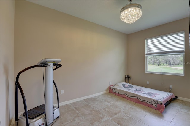3813 Salida Delsol Dr, Sun City Center, FL 33573 - bedroom with a chandelier and baseboards