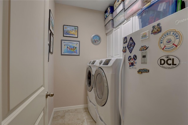 3813 Salida Delsol Dr, Sun City Center, FL 33573 - laundry room with washer and clothes dryer and baseboards