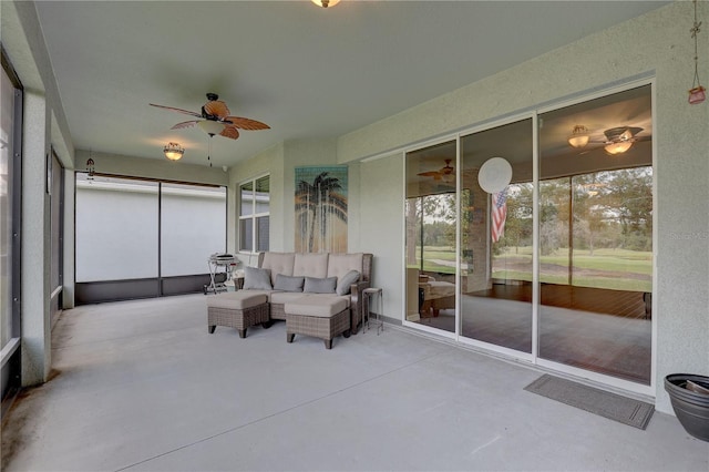 3813 Salida Delsol Dr, Sun City Center, FL 33573 - sunroom with ceiling fan and concrete floors