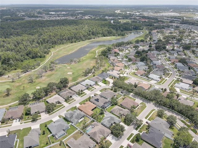 3813 Salida Delsol Dr, Sun City Center, FL 33573 - aerial view of property and surrounding area featuring a large body of water, a local golf course, a forest, and nearby suburban area