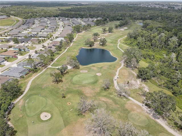 3813 Salida Delsol Dr, Sun City Center, FL 33573 - aerial overview of property's location with a large body of water, a golf course, a forest, and nearby suburban area