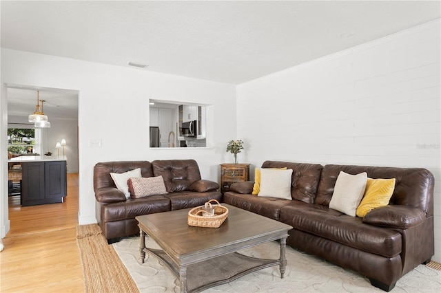 125 Live Oak Ln, Largo, FL 33770 - living area featuring light wood-style floors