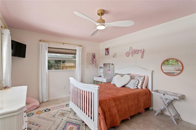 125 Live Oak Ln, Largo, FL 33770 - bedroom with a ceiling fan and baseboards