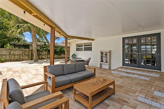125 Live Oak Ln, Largo, FL 33770 - view of patio featuring french doors and an outdoor hangout area