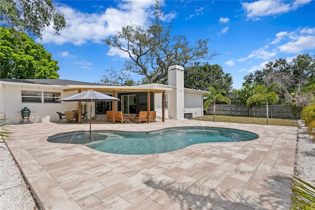 125 Live Oak Ln, Largo, FL 33770 - view of swimming pool featuring a patio and outdoor dining area
