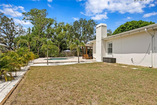 125 Live Oak Ln, Largo, FL 33770 - view of yard with a patio area