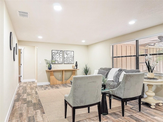 1025 Reading Rd, Lutz, FL 33558 - living room featuring wood finished floors, recessed lighting, and baseboards