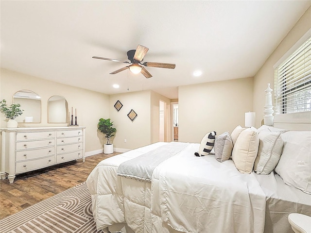 1025 Reading Rd, Lutz, FL 33558 - bedroom with wood finished floors, recessed lighting, ceiling fan, and baseboards