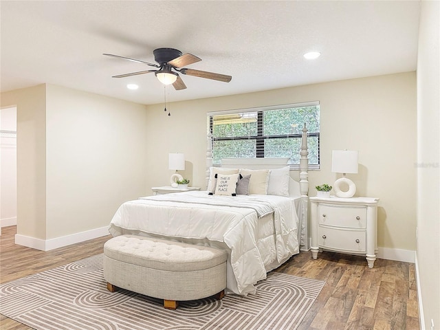 1025 Reading Rd, Lutz, FL 33558 - bedroom featuring wood finished floors, baseboards, recessed lighting, and a ceiling fan