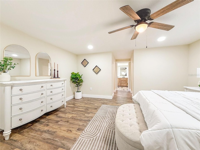 1025 Reading Rd, Lutz, FL 33558 - bedroom featuring wood finished floors, baseboards, recessed lighting, and a ceiling fan